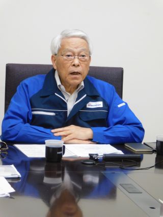 挨拶する野田会長